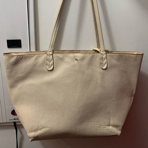 Very old but in decent condition, faux leather bcbg tote bag